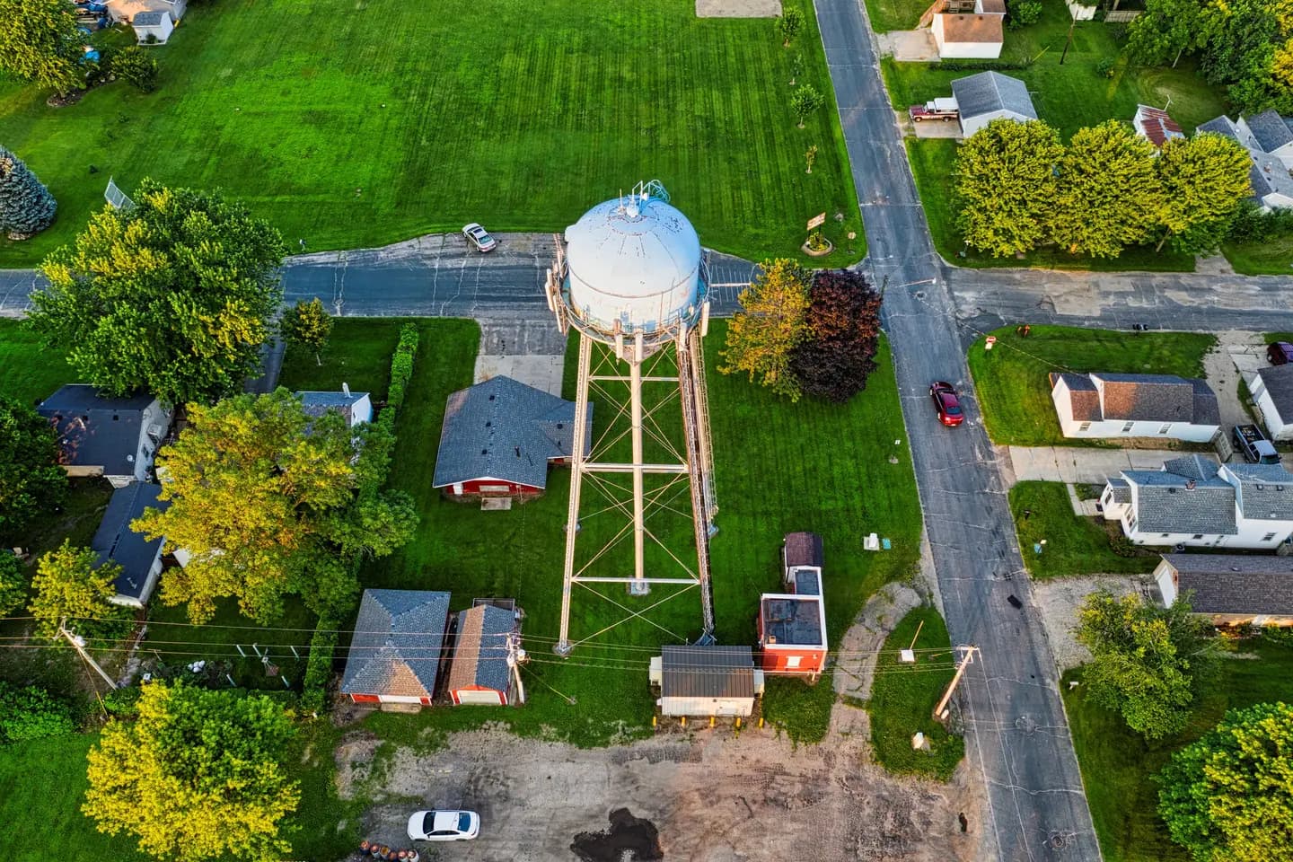 Illustrative scene, not evidence for this record: A water tower over a residential neighborhood in Austin, Minnesota.