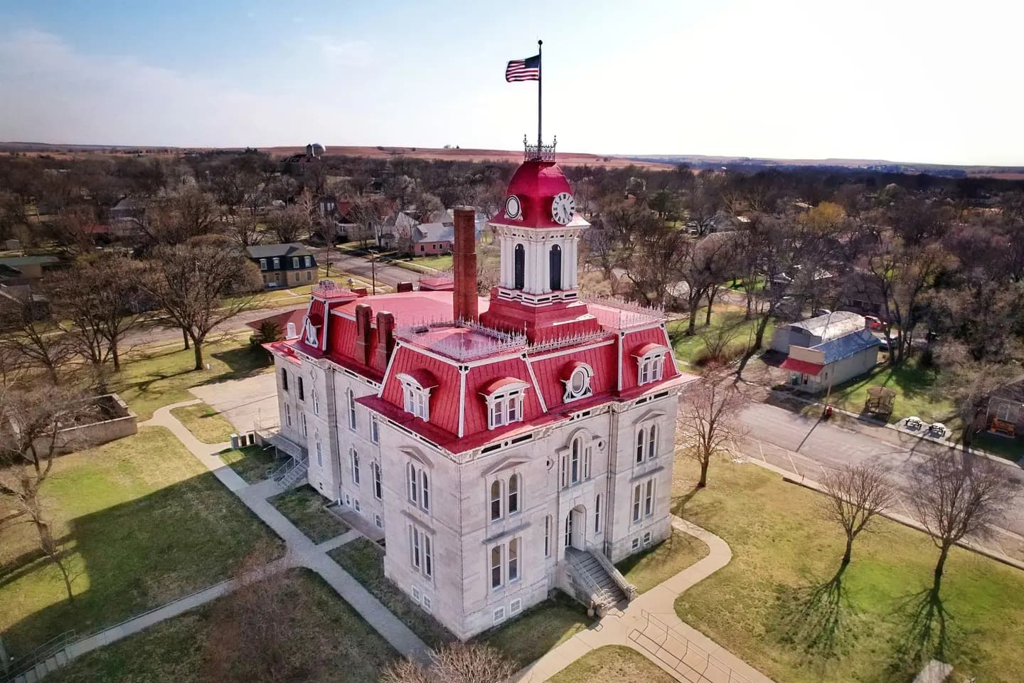 Illustrative scene, not evidence for this record: Aerial view of a county courthouse in Cottonwood Falls, Kansas.