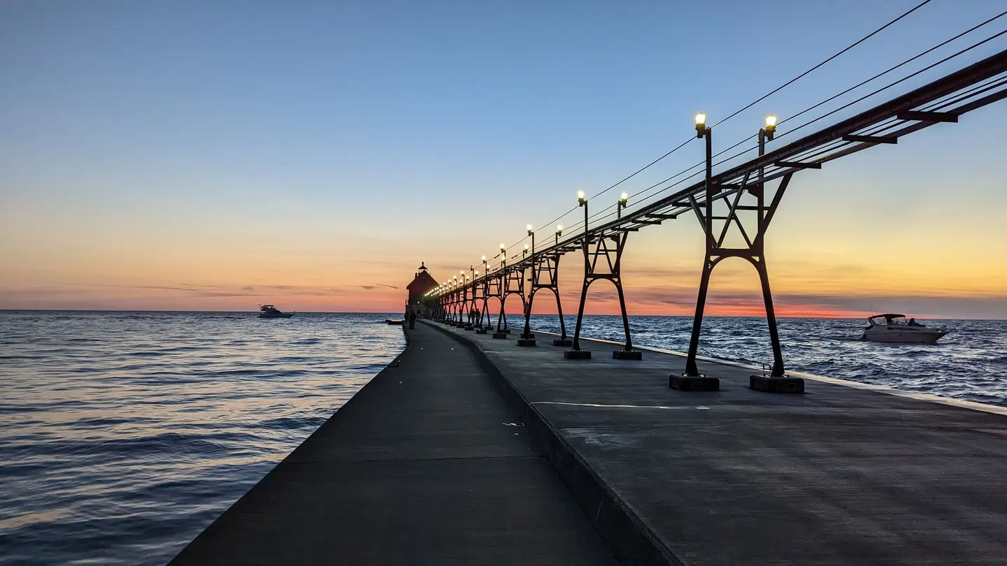 Illustrative scene, not evidence for this record: South Haven pier and lighthouse on Lake Michigan.