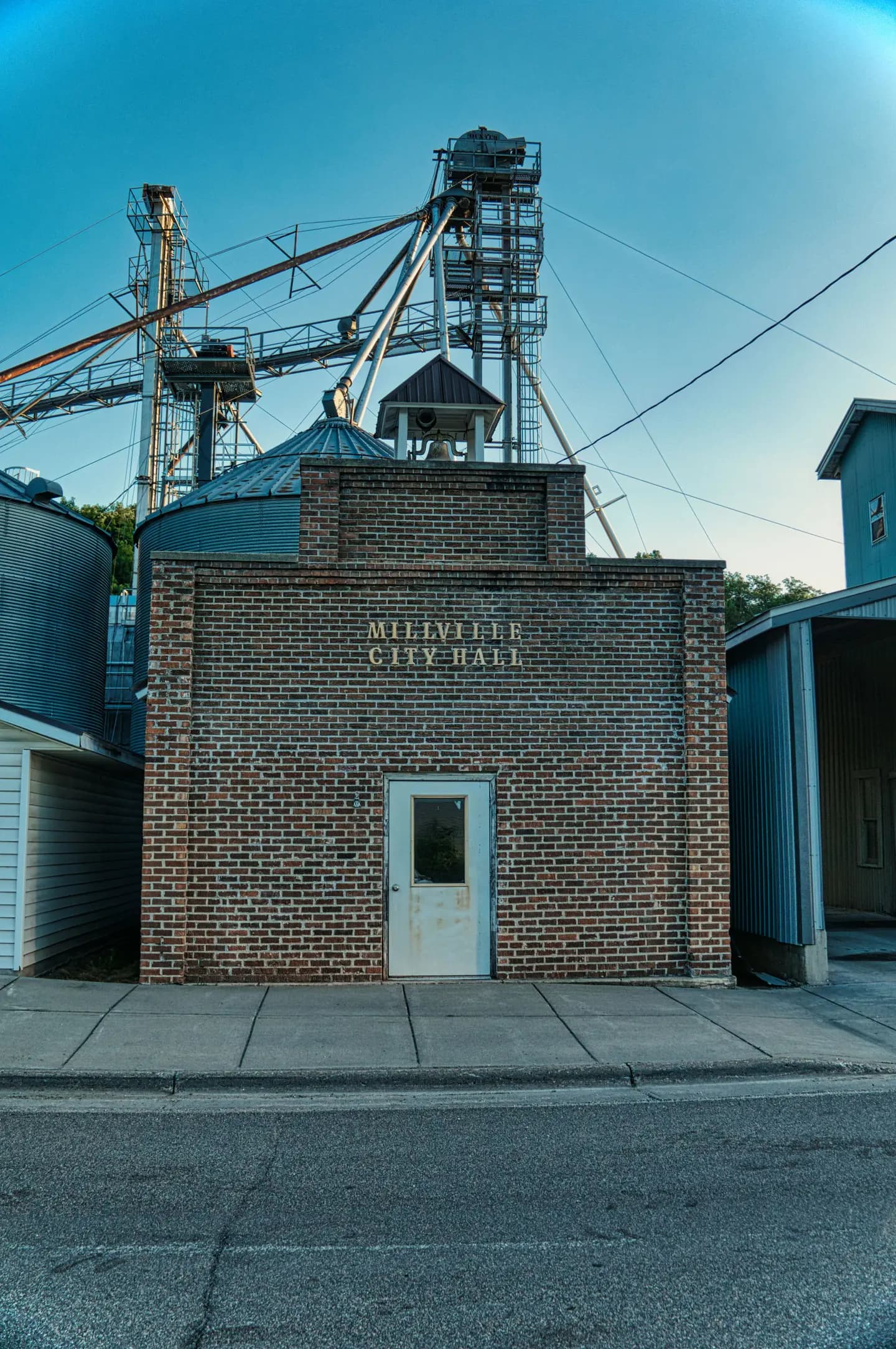 Illustrative scene, not evidence for this record: A small-town city hall entrance.