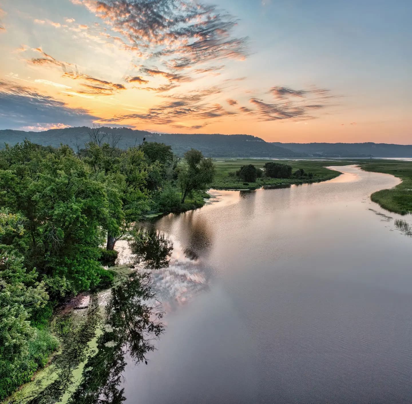 Illustrative scene, not evidence for this record: Sunrise over the Mississippi River at Nelson, Wisconsin.