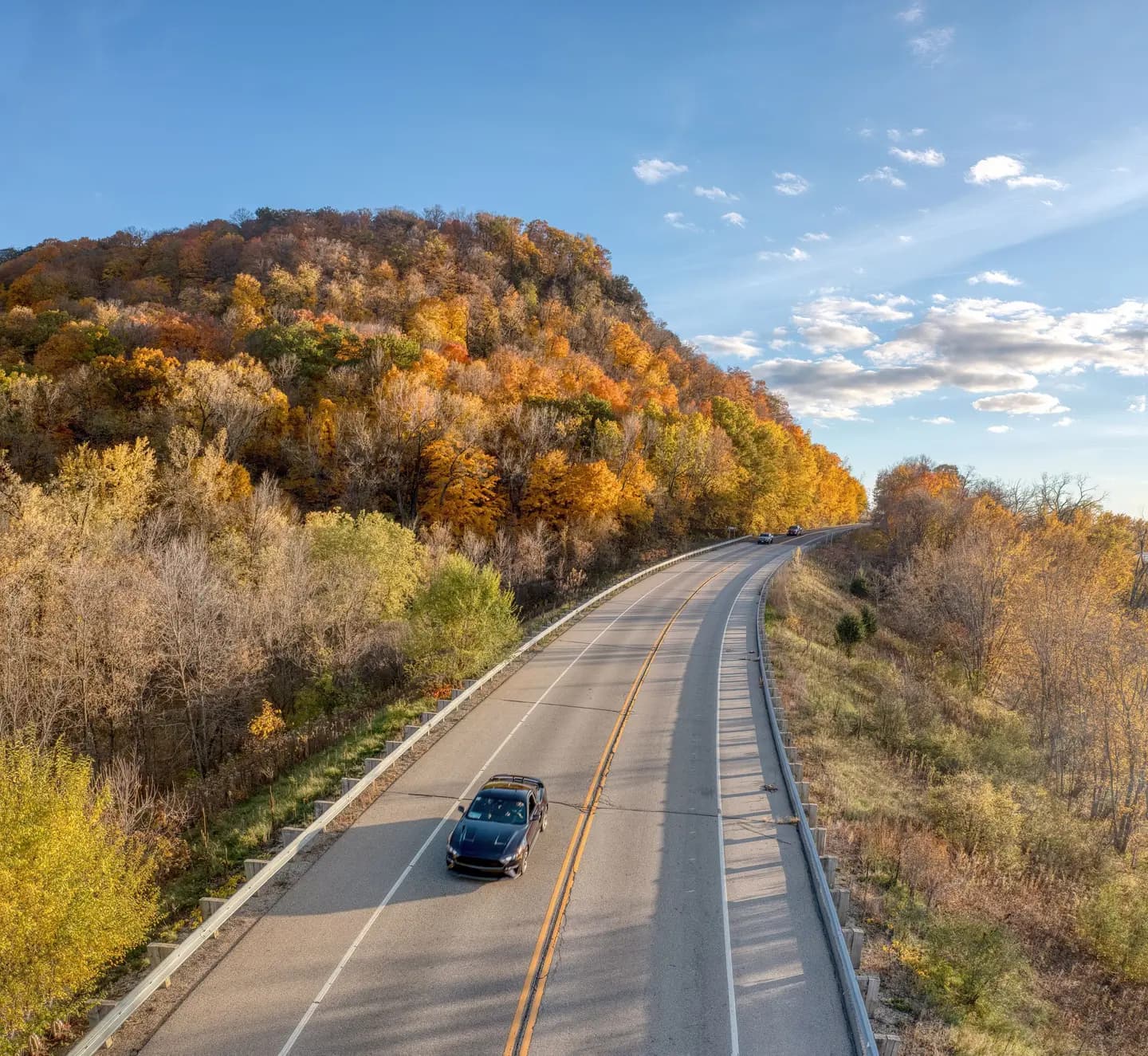 Illustrative scene, not evidence for this record: A country road in autumn near Stockholm, Wisconsin.